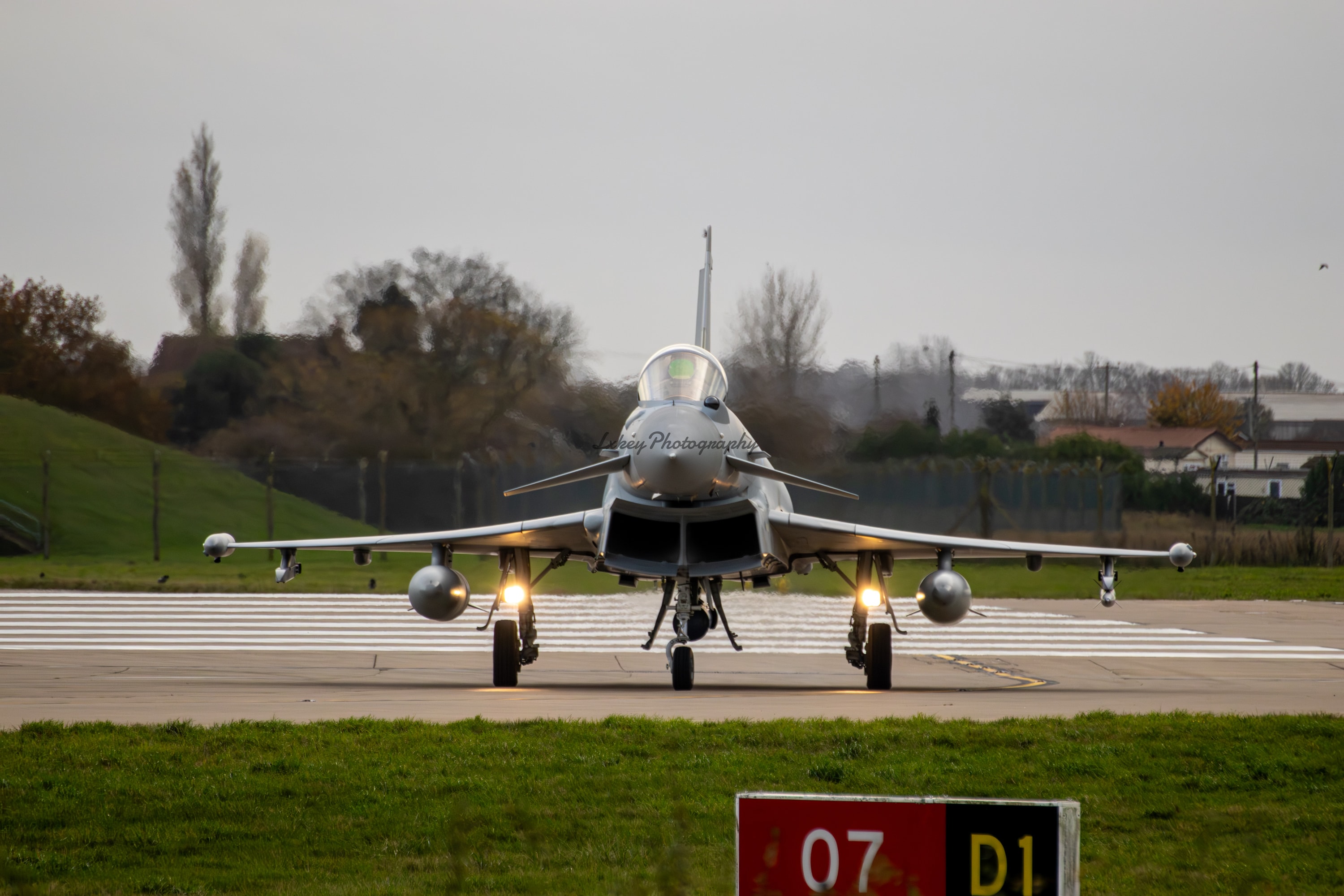 Royal Air Force Eurofighter Typhoon FGR4 taxiing head-on with landing lights illuminated